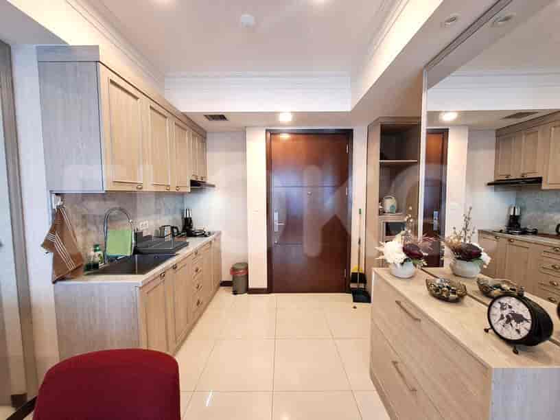 A well-equipped kitchen with wooden cabinets.