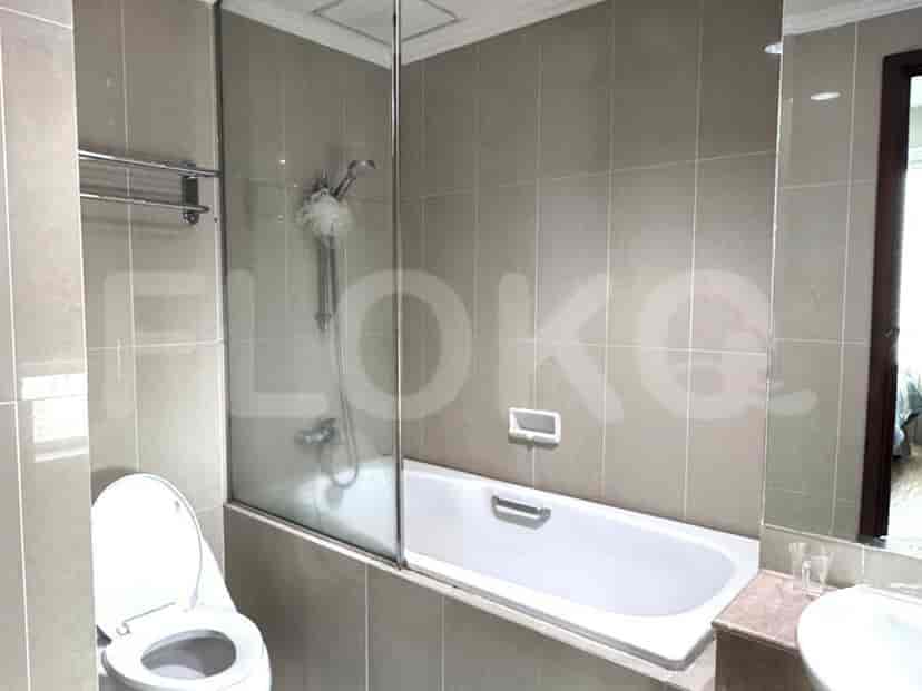 A bathroom with a bathtub, a shower, and a toilet.