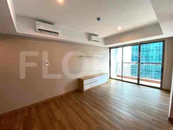 Modern living room with wooden flooring and a view.