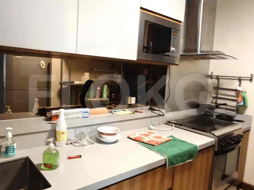Modern kitchen with stainless steel appliances.