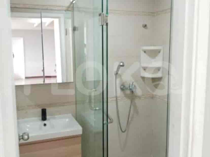 Bathroom with a shower, a vanity, and a mirror.
