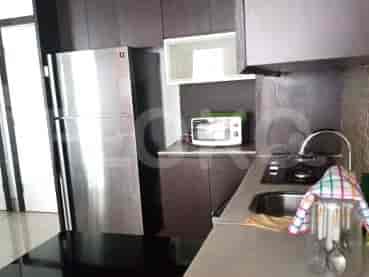 Modern kitchen with stainless steel appliances.