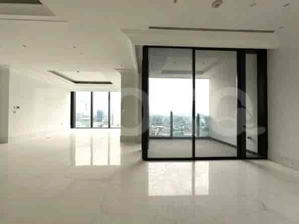 Spacious living room with large windows, a marble floor, and white walls.