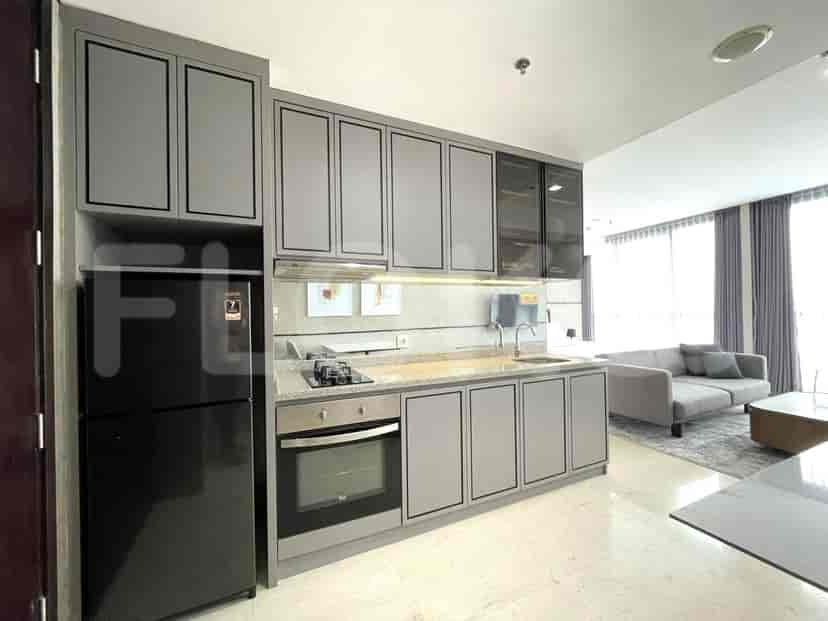 Close up of the kitchenette appliances and cabinetry.