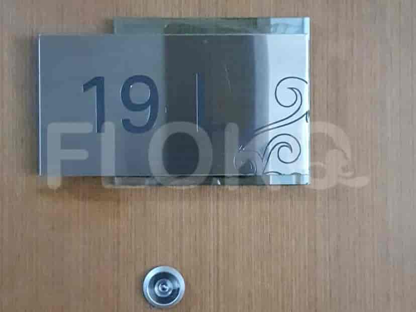 Door with apartment number.