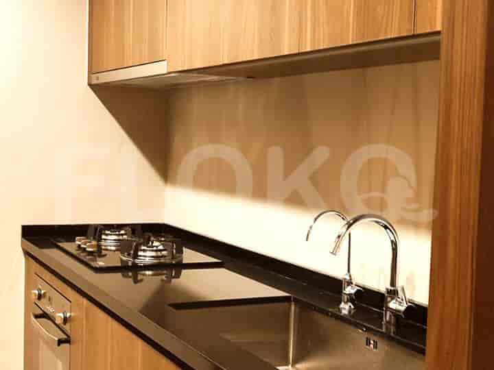A kitchen with cabinetry and a cooktop.