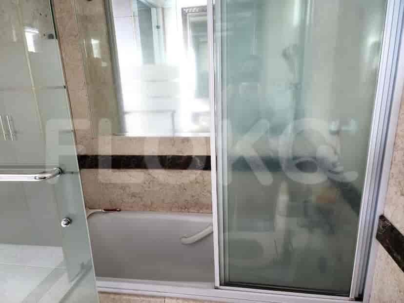 Bathroom with a shower and a bathtub.