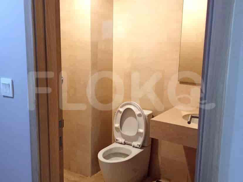 Bathroom with a toilet and sink.