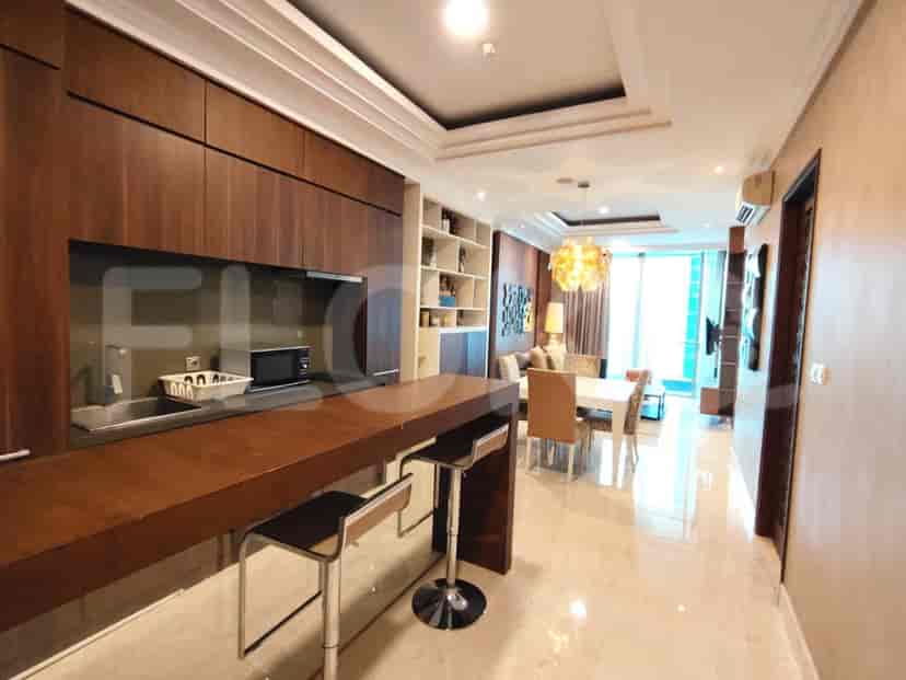 An open plan view integrating kitchen, dining, and living areas to showcase a modern design.