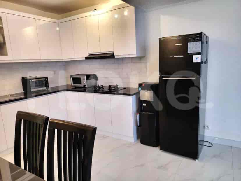 Modern kitchen with appliances and cabinetry.
