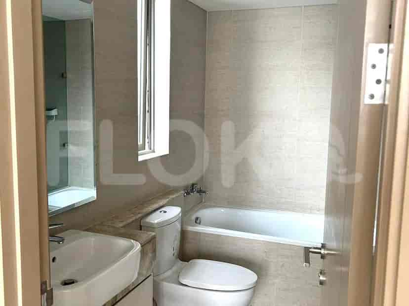 Bathroom with bathtub, toilet and sink.