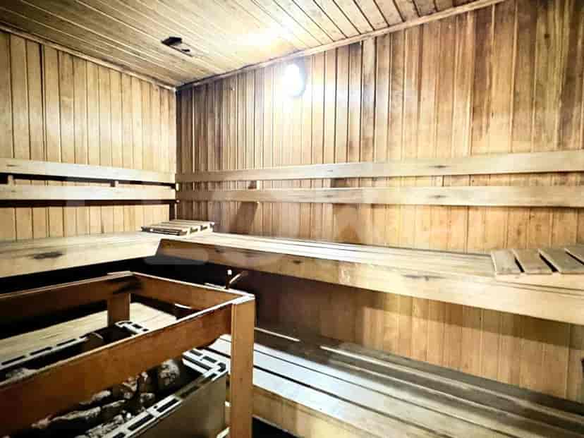 A wooden sauna with benches.