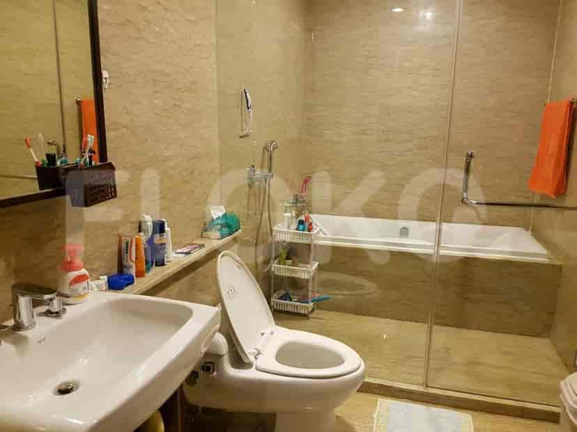 Modern bathroom with a tub, shower, and contemporary fixtures.