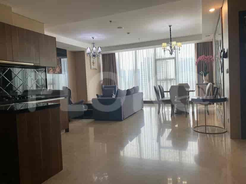 Combined living and kitchen area, showcasing a modern design and elegant decor.