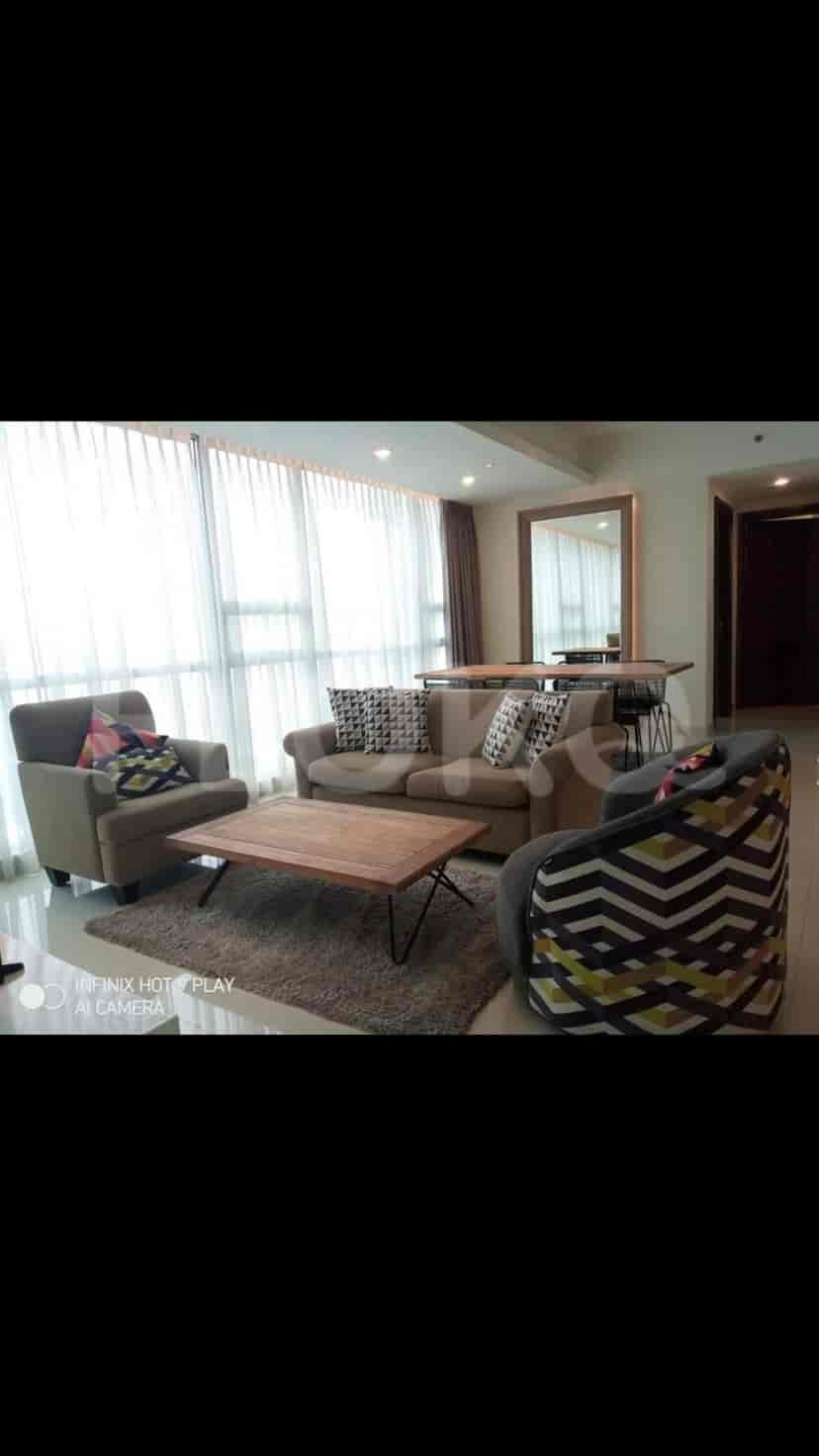 Living room featuring comfortable seating and a coffee table.