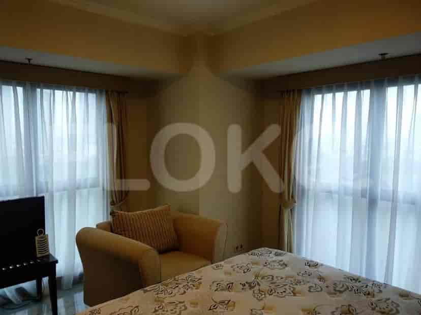 Bedroom with a bed and a window