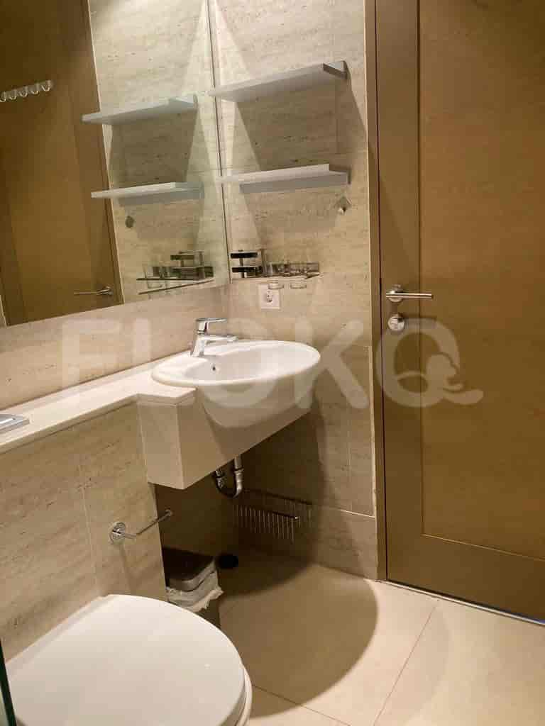 Modern bathroom with a sink and a view.