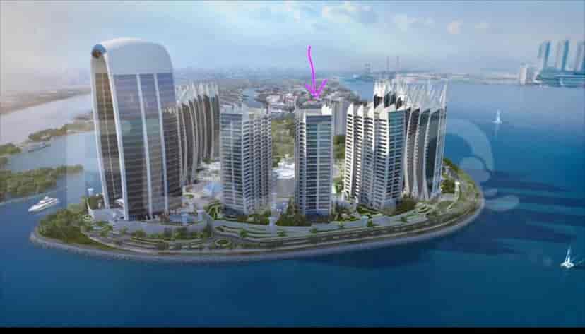 A building complex with waterfront view.