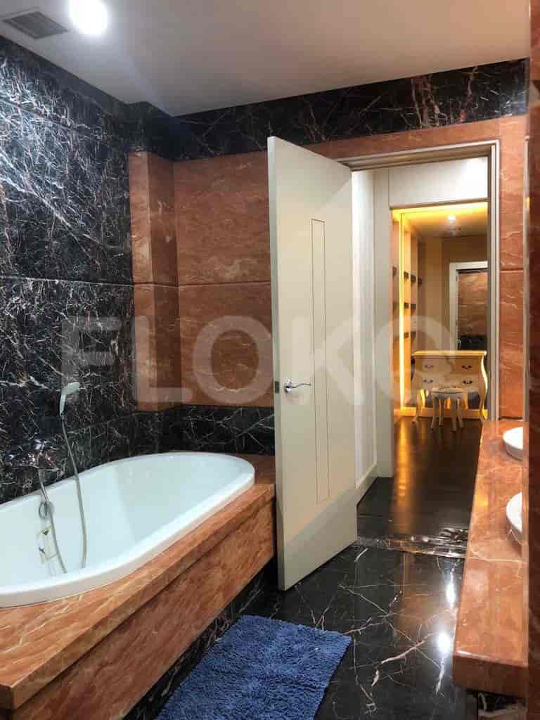 A luxurious bathroom with a bathtub.