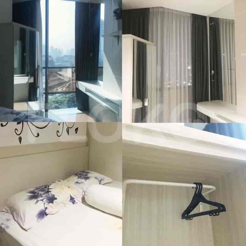 A modern bedroom setup, with city view.