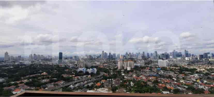 Panoramic view of the city skyline from the apartment window.