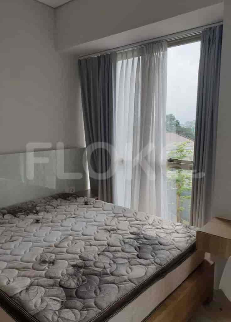 Bedroom with a queen-sized bed.