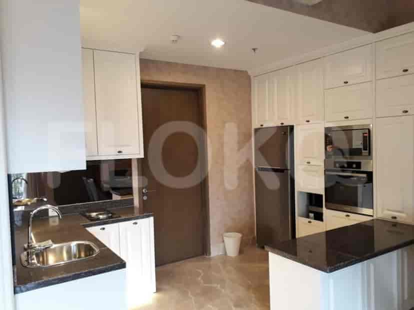 A fully equipped kitchen featuring modern appliances and stylish design.