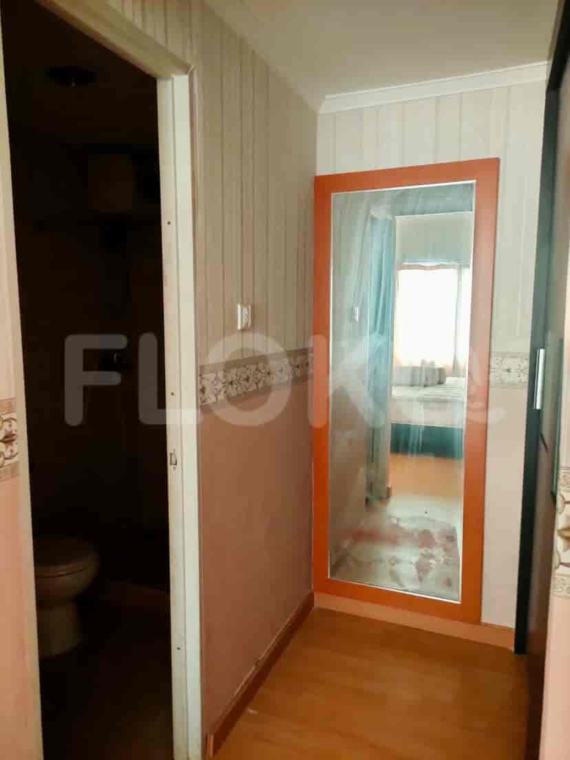 Hallway with a mirror.