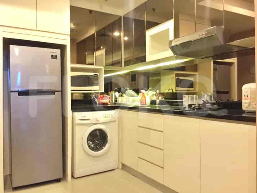A modern kitchen with stainless steel appliances and ample cabinet space.