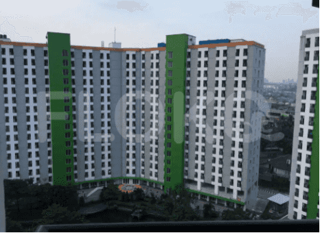 A tall building with many windows.