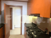 Kitchen with stove and cabinets.