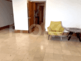 Living room with an armchair.