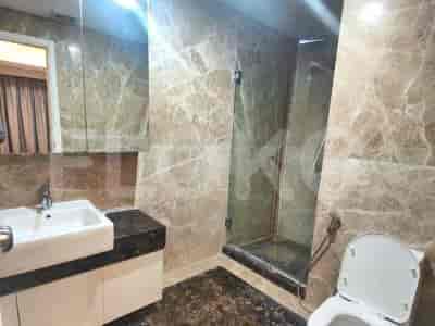 A modern bathroom with a shower.
