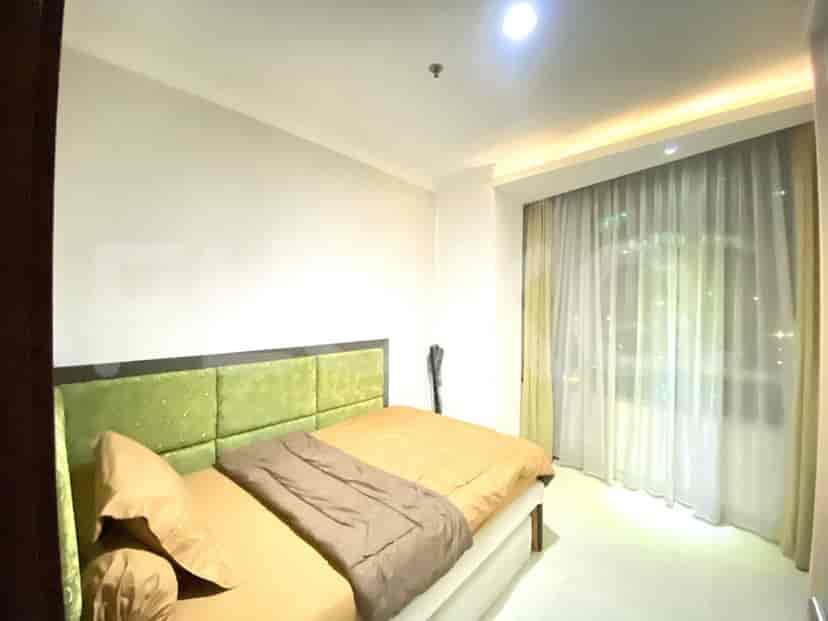 Another view of the bedroom with a queen bed.