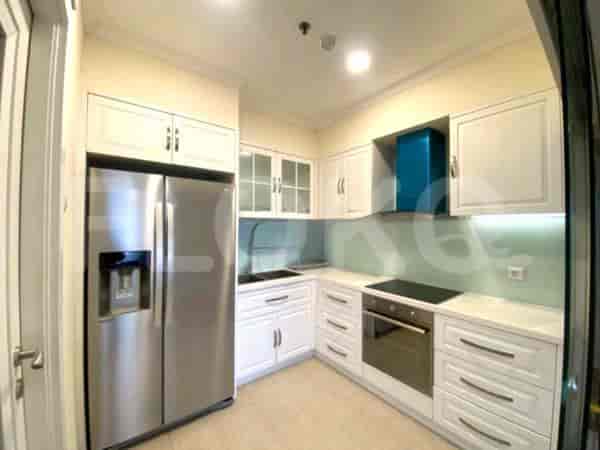 Modern kitchen with stainless steel appliances.