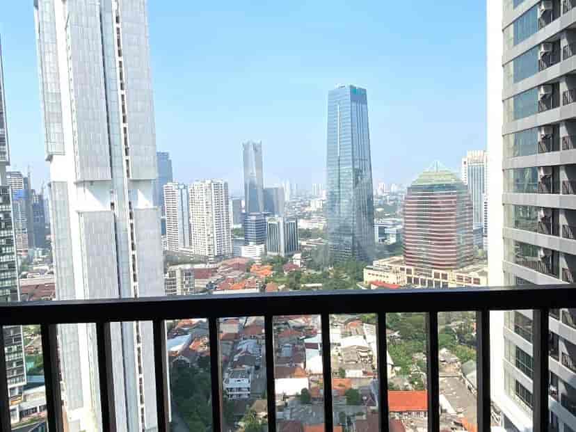 City view from the balcony of an apartment.