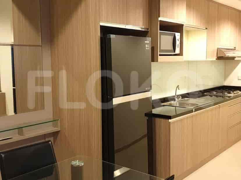 Bathroom with a bathtub, sink and shower curtain.