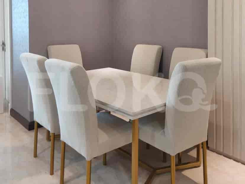Dining area with a table and chairs.