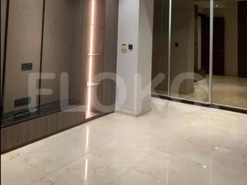 Luxurious bedroom with built-in wardrobe, en-suite bathroom visible.
