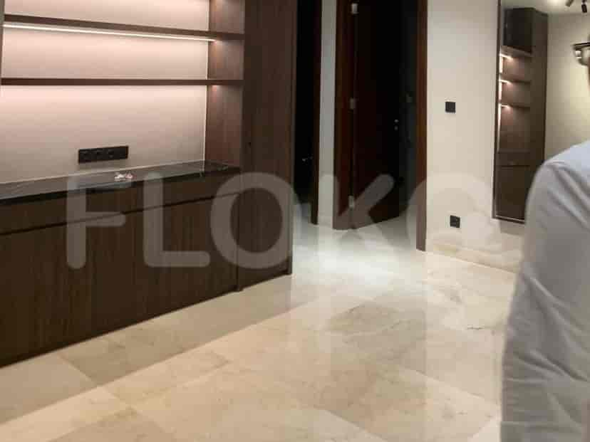 Luxurious bedroom with built-in wardrobe, en-suite bathroom visible