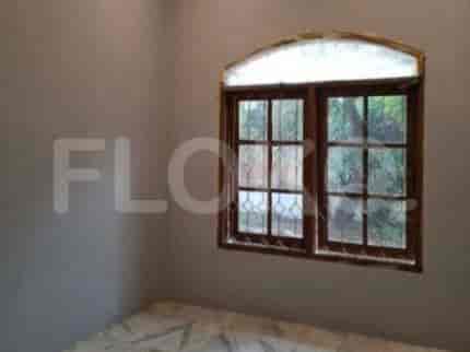 Bedroom interior with window with wooden frames.