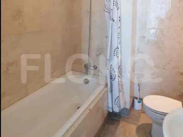 Bathroom with a bathtub and toilet.