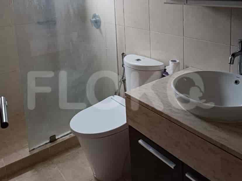 Bathroom with a toilet and a sink.