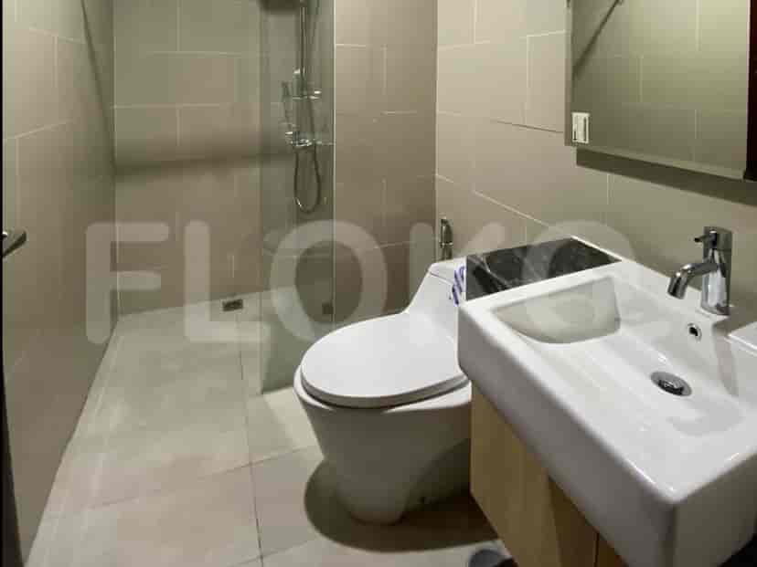 A contemporary bathroom with a walk-in shower and modern fixtures.