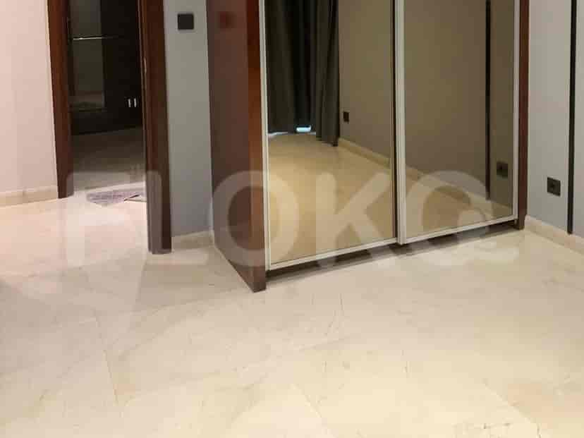 Modern bedroom with sliding door wardrobe.