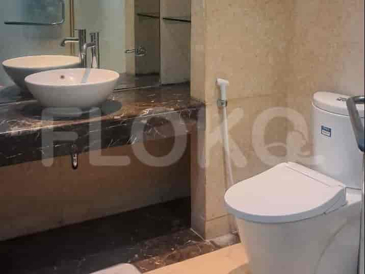 Bathroom with a toilet and a sink.