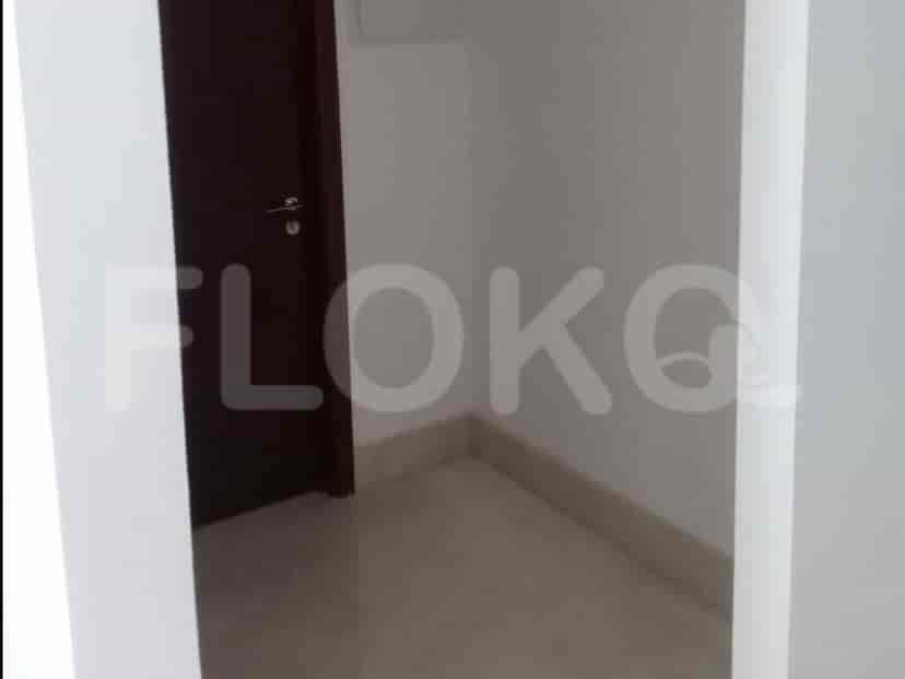 A short hallway with a door