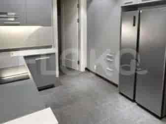 A modern kitchen with grey cabinets, stainless steel appliances including a double-door refrigerator, and tiled flooring.