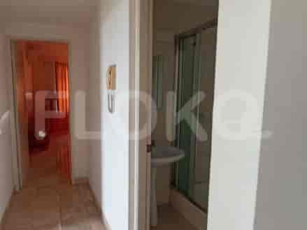 Hallway with doors leading to different rooms.