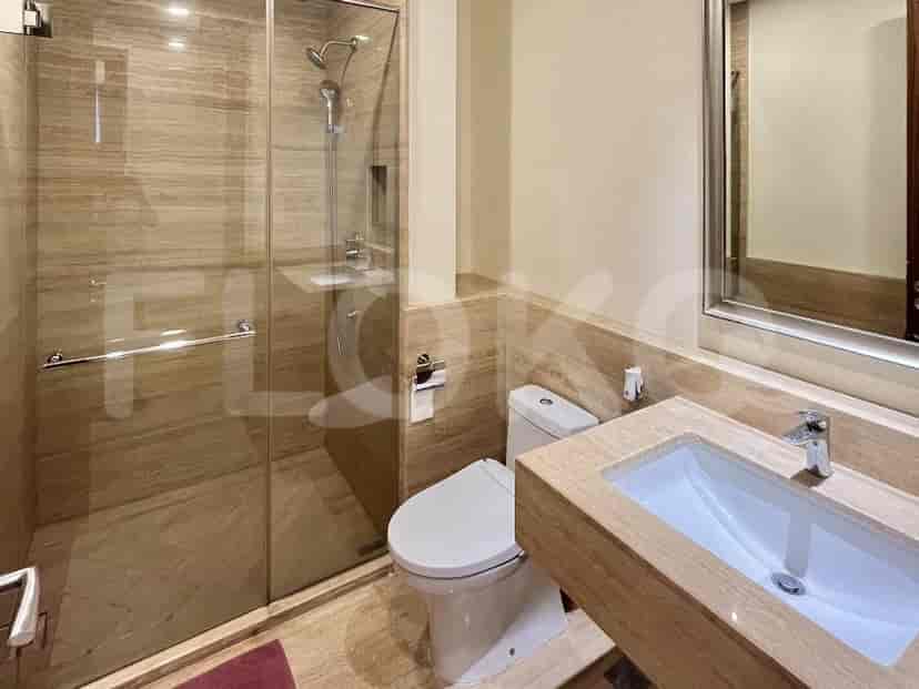 A modern bathroom with a shower and contemporary design.